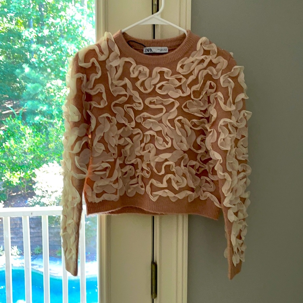 Zara’s sweater